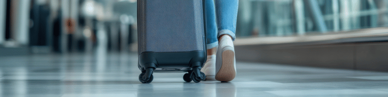 Traveling women with suitcase