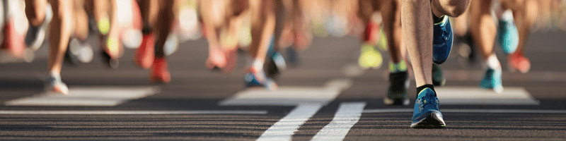 Runners feet on road